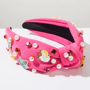 Detail of pink knotted headband with MOM charms, pearls and Happy Mother's Day crystal motifs