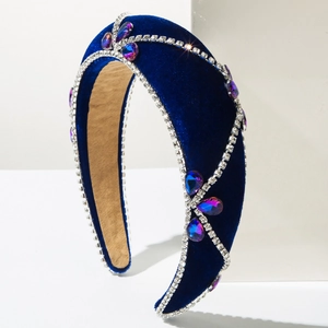 Close-up of luxury navy blue velvet headband with sparkling crystals and rhinestones