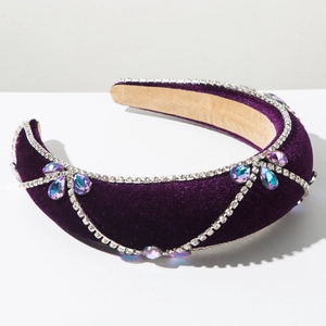 Detail of purple velvet headband with crystal chain and iridescent rhinestone accents