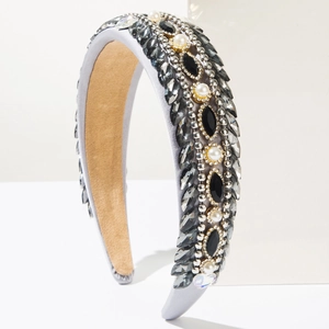 Detail view of Baroque velvet headband with gray rhinestones and white pearls inlay