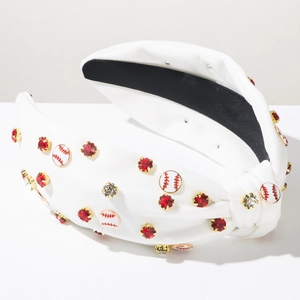 Detail of white knotted baseball headband featuring red rhinestones and enamel baseball charms