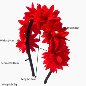 Detail showing red fabric flowers with white pearls on a headband with size measurements