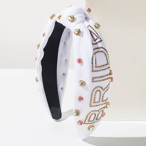 White knotted wide headband with sparkling rhinestones and gold BRIDE lettering for weddings