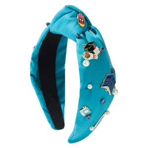 Blue satin headband with rhinestones and school-themed charms like pencils and books