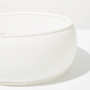 Close-up of white lychee pattern leather headband with precision stitching detail