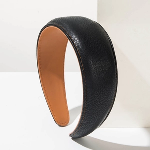 Classic black faux leather padded headband with contrast yellow stitching detail
