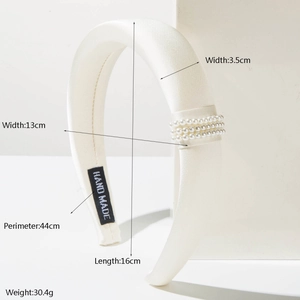 Elegant white satin padded headband with triple pearl accents and handmade detail