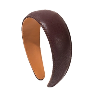 Classic wide-brimmed dark brown faux leather headband with orange contrast stitching
