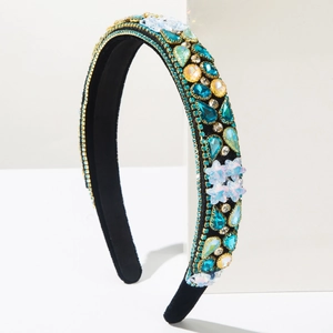 Detailed close-up of Baroque headband with multicolored rhinestones and floral elements