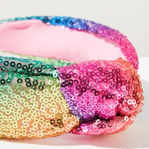 Dettaglio della fascia con paillettes colorate, finitura glitterata e fodera in tessuto