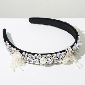 Detailed view of baroque headband with rhinestones, pearls, and dangling tassels