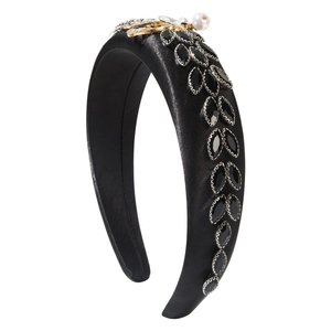Elegant black satin headband with sparkling rhinestones, pearls and golden floral details