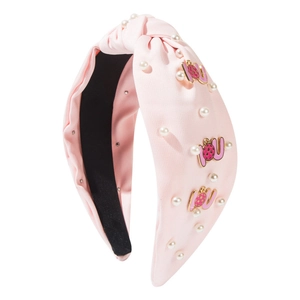 Pink knotted wide headband with pearls and gold YOU pendants on white background