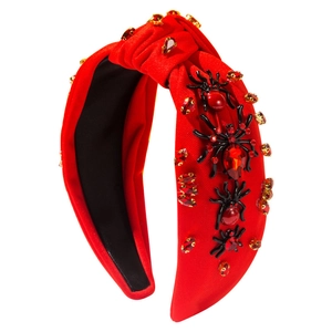 Halloween knot headband featuring red fabric with jeweled black spiders and crystals