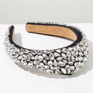 Close-up of luxury Baroque headband with crystal rhinestones and thick black fabric base