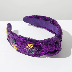 Detail of purple sequin knotted headband with colorful handmade bead embroidery