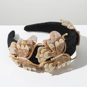 Detail of luxury black velvet headband featuring three 3D crystal butterfly ornaments