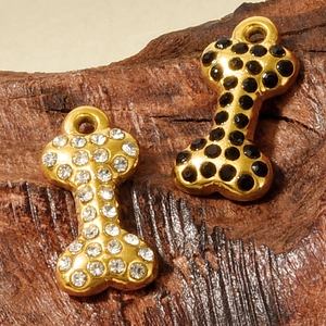Macro shot of 304 stainless steel bone charms with crystal rhinestones for DIY jewelry