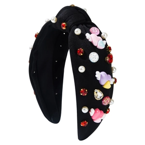 Fashion headband with pearls, rhinestones, and winged heart charms on black satin base