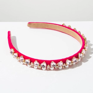 Detail of velvet headband with pink crystal hearts, pearls and rhinestones