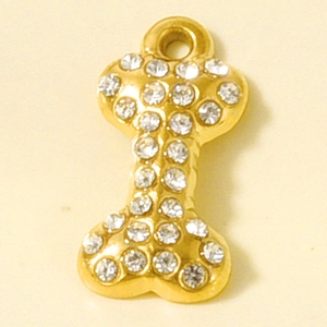 Macro shot of 304 stainless steel bone pendant with rhinestones for DIY jewelry