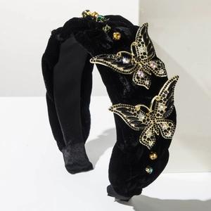 Serre-tête baroque en velours noir orné de papillons dorés et cristaux colorés