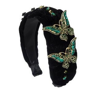Serre-tête baroque en velours noir avec des papillons dorés et des strass vert émeraude