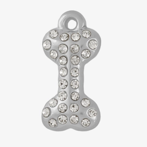 Macro shot of 304 stainless steel bone pendant with clear rhinestones for DIY jewelry making