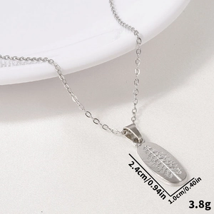 Macro shot of 304 stainless steel leaf pendant showing 2.4cm by 1.0cm dimensions