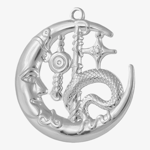 Macro shot of 304 stainless steel crescent moon and dragon pendant with intricate details