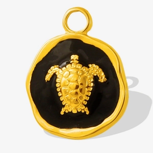 Detailed close-up of 304 stainless steel gold turtle pendant with black enamel finish
