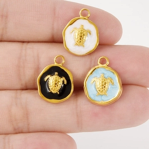 304 stainless steel sea turtle pendants in white, black and blue enamel with gold finish