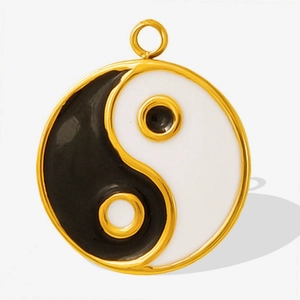 Detail shot of a 304 stainless steel Yin Yang pendant with black and white enamel finish