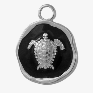 Detailed macro shot of 304 stainless steel turtle pendant with black oil drip effect