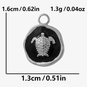 Detail of a 304 stainless steel turtle pendant with dimensions 1.6cm x 1.3cm and 1.3g weight