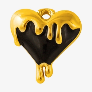 Macro view of heart pendant featuring gold melting effect on black 304 stainless steel