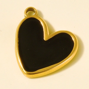 Detail of heart-shaped gold stainless steel charm with black enamel for DIY jewelry