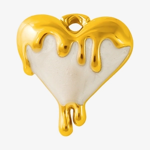 Macro detail of a 304 stainless steel heart pendant with gold melting drop effect