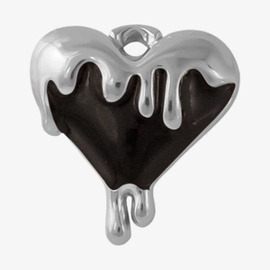 Macro shot of 304 stainless steel heart pendant with lava drip design in silver and black