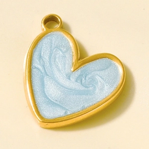 Detail of light blue enamel heart pendant with golden metal edge and suspension ring