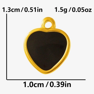 Detailed view of black enamel heart pendant with dimensions 1.3cm height and 1.0cm width