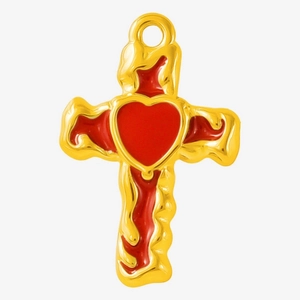 Detail of gold-plated cross pendant with red enamel heart and liquid lava effect