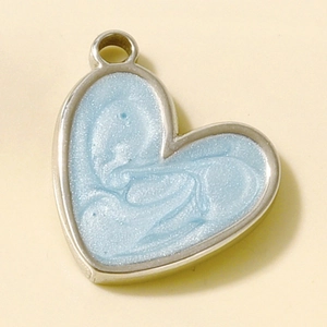 Detailed view of heart-shaped stainless steel pendant with light blue swirl enamel oil
