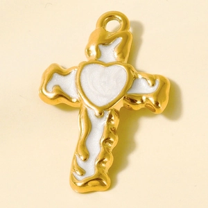 Detail of a 304 stainless steel heart cross pendant with white enamel and lava texture