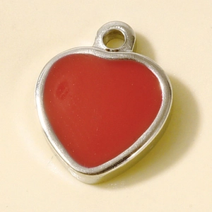Close-up of heart-shaped pendant with red enamel and stainless steel silver frame