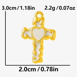 Macro detail of gold stainless steel cross heart pendant showing 3.0cm height dimensions