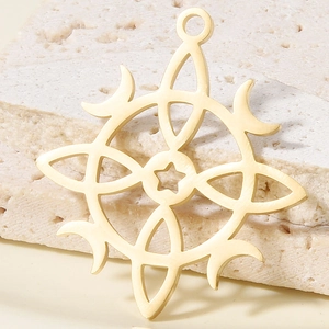 Detailed macro view of 304 stainless steel celestial sun and moon cutout pendant with star