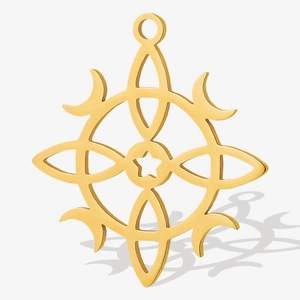 Detail of 304 stainless steel gold pendant with cutout sun and moon celestial designs