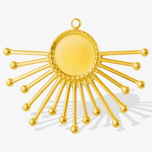 Macro detail of golden stainless steel sunburst pendant with DIY inlay base