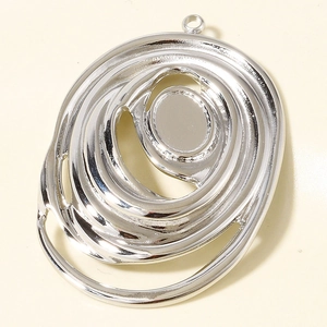 Macro view of silver 304 stainless steel irregular nested oval pendant for jewelry making